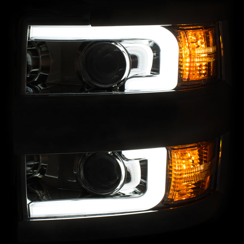 ANZO Faros delanteros proyectores 15-17 Chevrolet Silverado 2500HD / 3500HD cromados con borde cromado
