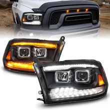 Cargar imagen en el visor de la galería, ANZO 09-18 Dodge Ram 1500/2500/3500 Proj HL Faros delanteros conmutados + secuenciales - Negro ámbar