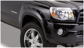 Bushwacker 05-11 Toyota Tacoma Fleetside Pocket Style Flares 4 piezas 60.3 pulgadas cama - Negro