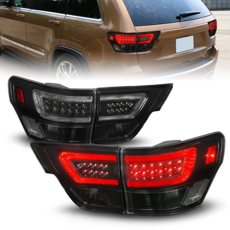 ANZO 11-13 Jeep Grand Cherokee Luces traseras LED con barra de luces Carcasa negra/lente ahumada 4 piezas