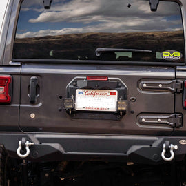 DV8 Offroad 18-22 Jeep Wrangler JL Kit de eliminación de neumáticos de repuesto con soportes de luz