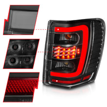 Cargar imagen en el visor de la galería, ANZO 1999-2004 Jeep Grand Cherokee luces traseras LED con barra de luz, carcasa negra, lente transparente