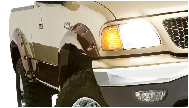 Bushwacker 97-03 Ford F-150 bengalas estilo recortado 2 piezas - negro