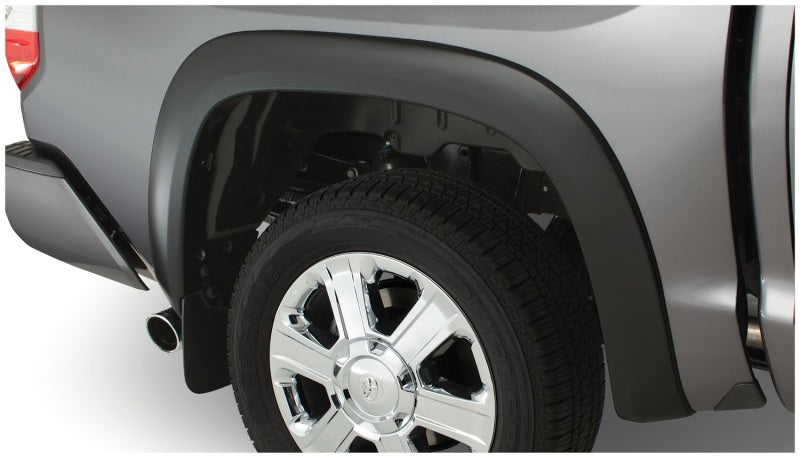 Bushwacker 07-13 Toyota Tundra Fleetside OE Style Flares 4 piezas con guardabarros de fábrica - Negro
