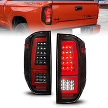 Cargar imagen en el visor de la galería, ANZO 2014-2021 Toyota Tundra luces traseras LED carcasa negra/lente transparente
