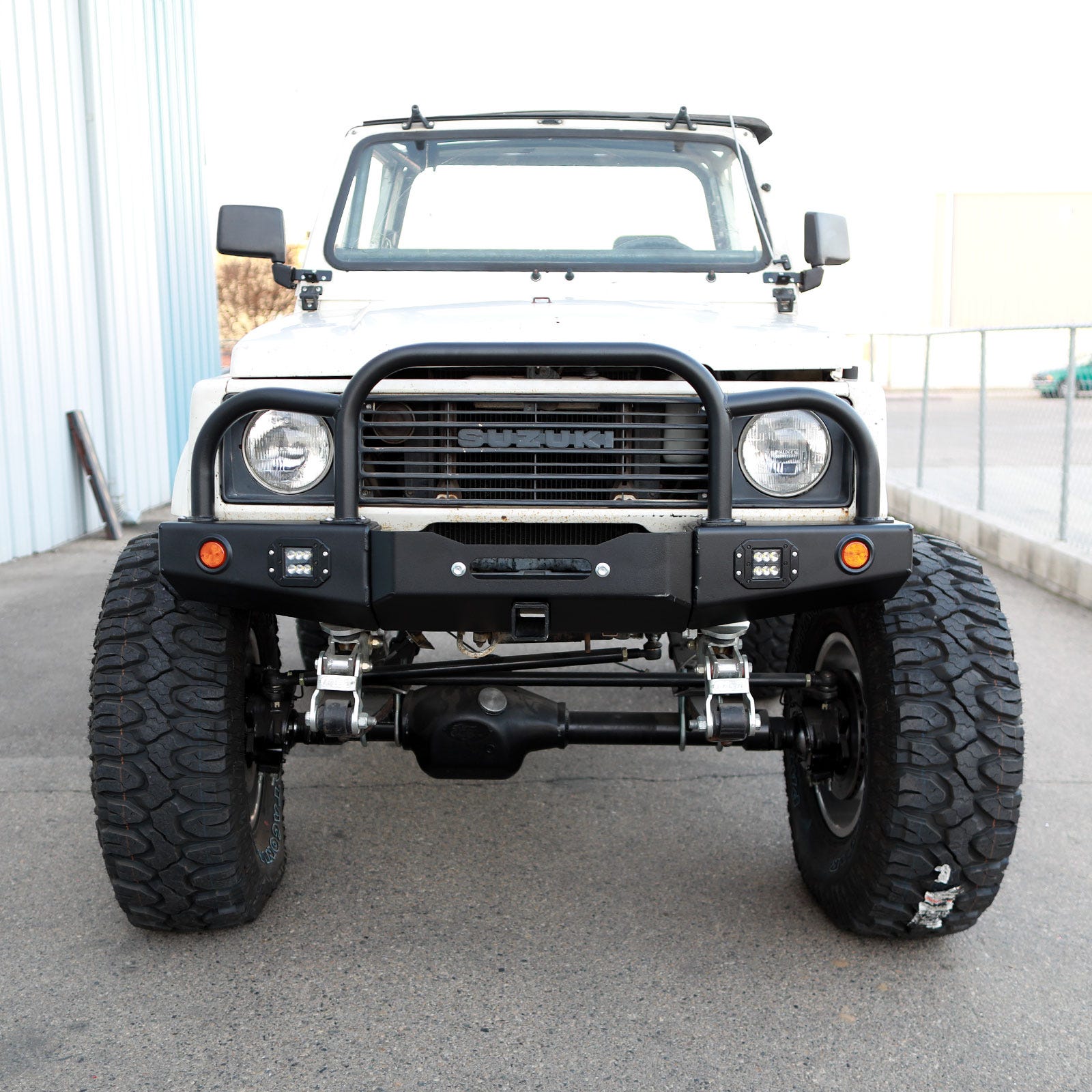 86-95 Suzuki Samurai Front Bumpers - 0-1 Inch Winch Plate Long Ends Grill and Headlight Guard Black Powder Coat Low Range Off Road