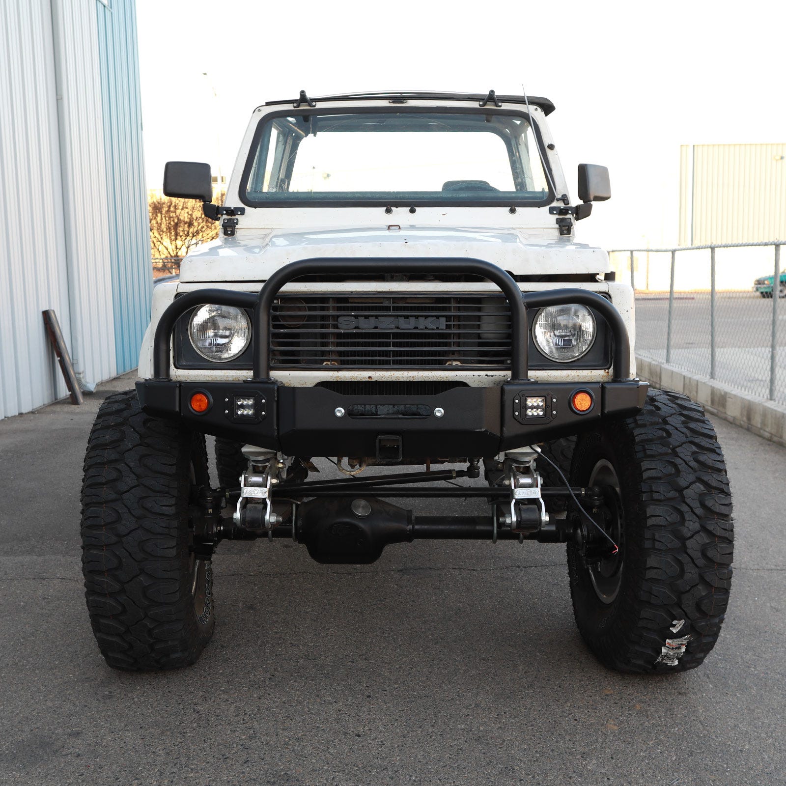 86-95 Suzuki Samurai Front Bumpers - 2-3 Inch Winch Plate Long Ends Grill and Headlight Guard Black Powder Coat Low Range Off Road