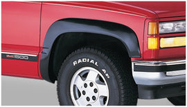 Bushwacker 97-99 Chevy Tahoe OE Style Flares 4 piezas solo 4 puertas, color negro