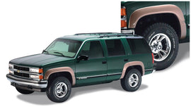 Bushwacker 97-99 Chevy Tahoe OE Style Flares 4 piezas solo 4 puertas, color negro