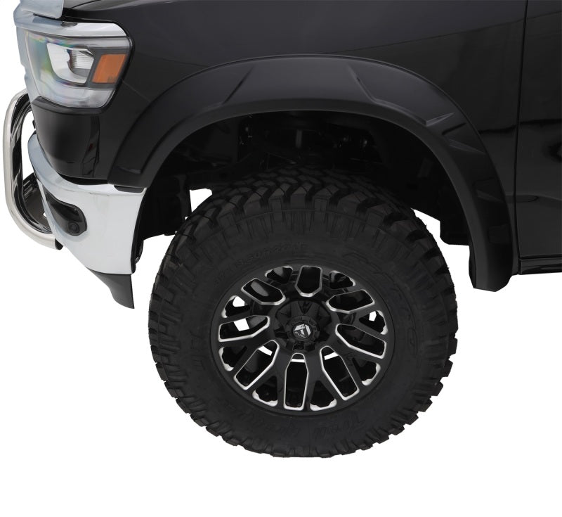 Bushwacker 14-19 Toyota Tundra con cama de 66.7 pulgadas estilo DRT bengalas 4 piezas - negro