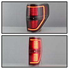 Cargar imagen en el visor de la galería, xTune 09-14 Ford F-150 Light Bar LED Tail Lights - Black (ALT-JH-FF15009-LBLED-BK)