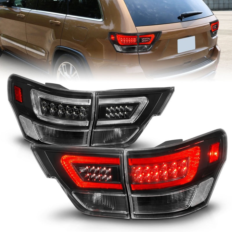ANZO 11-13 Jeep Grand Cherokee Luces traseras LED con barra de luces Carcasa negra/lente transparente 4 piezas