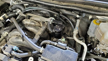 Cargar imagen en el visor de la galería, J&amp;L 17-24 Nissan Armada / 14-24 Infiniti QX80 5.6L Driver Side Oil Separator 3.0 - Black Anodize