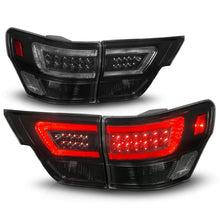 Cargar imagen en el visor de la galería, ANZO 11-13 Jeep Grand Cherokee Luces traseras LED con barra de luces Carcasa negra/lente ahumada 4 piezas