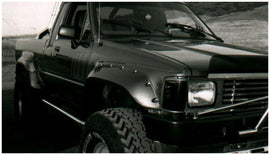 Bushwacker 84-88 Toyota Cutout Style Flares 2 piezas compatibles con cama nacional o importada - Negro