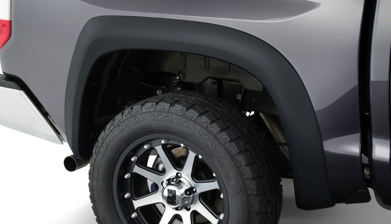 Bushwacker 14-18 Toyota Tundra Fleetside Extend-A-Fender estilo bengalas 4 piezas - negro