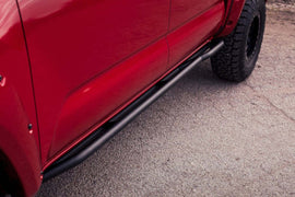 Body Armor 4x4 05-22 Toyota Tacoma Doble Cabina Cama Corta Revo Rock Sliders - Negro