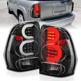 ANZO 2002-2009 Chevrolet Trailblazer luces traseras LED con barra de luz, carcasa negra, lente transparente