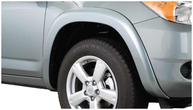 Bushwacker 09-11 Toyota RAV4 OE Style Flares 4 piezas base solamente - Negro