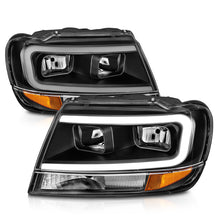 Cargar imagen en el visor de la galería, Faros delanteros de cristal ANZO 99-04 Jeep Grand Cherokee - con barra de luz y carcasa negra