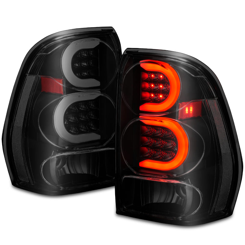 ANZO 2002-2009 Chevrolet Trailblazer luces traseras LED con barra de luz, carcasa negra, lente ahumada