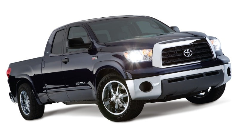 Bushwacker 07-13 Toyota Tundra Fleetside OE Style Flares 4 piezas con guardabarros de fábrica - Negro