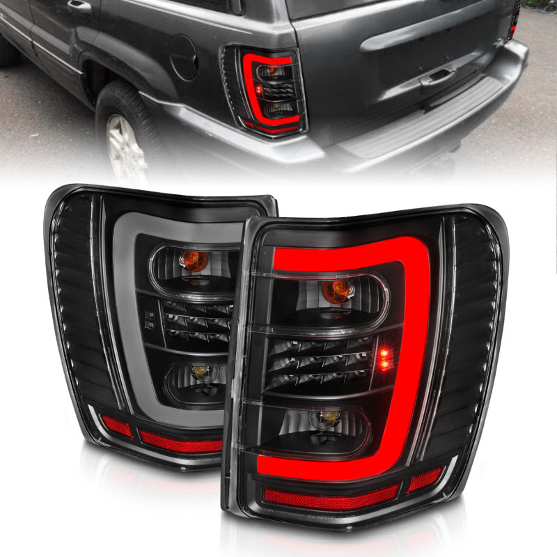 ANZO 1999-2004 Jeep Grand Cherokee luces traseras LED con barra de luz, carcasa negra, lente transparente