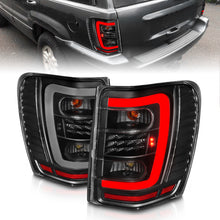 Cargar imagen en el visor de la galería, ANZO 1999-2004 Jeep Grand Cherokee luces traseras LED con barra de luz, carcasa negra, lente transparente