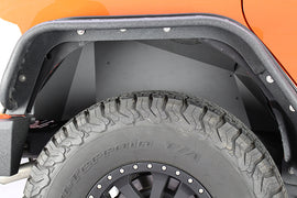 Guardabarros interiores traseros de aluminio Fishbone Offroad 07-18 Jeep Wrangler JK - Black Powercoat