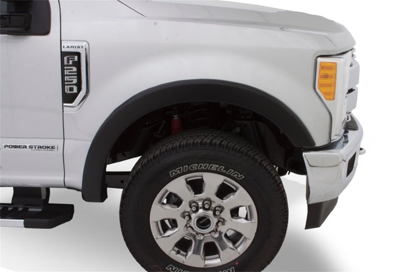 Bushwacker 11-16 Ford F-250 Super Duty OE estilo bengalas 4 piezas - negro