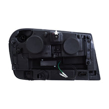 Cargar imagen en el visor de la galería, ANZO 2006-2009 Chevrolet Trailblazer Proyector Faros delanteros con diseño estilo tablón negro con ámbar