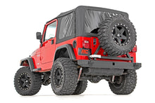 Cargar imagen en el visor de la galería, tj-rear-bumper-tire-carrier-install.jpg